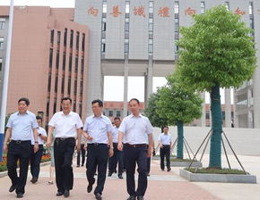 江苏省丰县党政领导考察团莅临固镇县毛钽厂实验中学考察指导工作